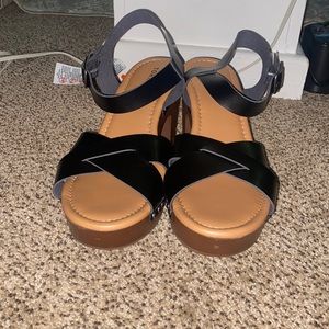 Size 13 wood heels with black strap! Never worn!